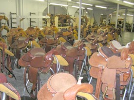 dozens of saddles in stock